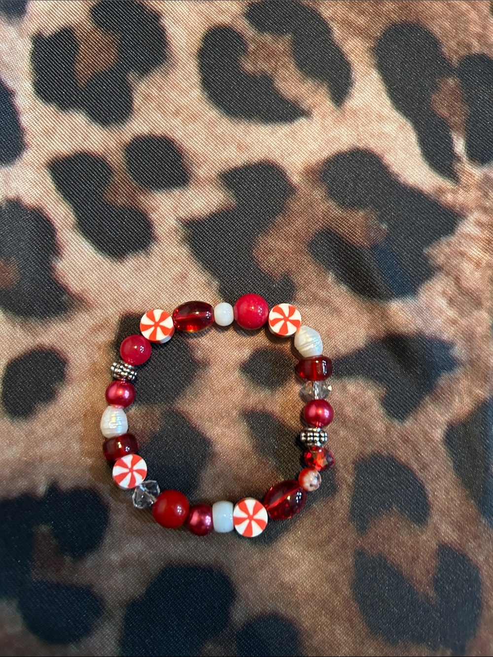 Hand Crafted Red and White Beaded Stretch Bracelet with Candy Accent